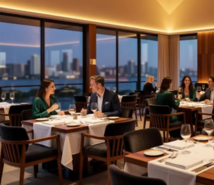 Warm evening dining ambience at TheGoldenFfold with elegantly set tables and attentive service